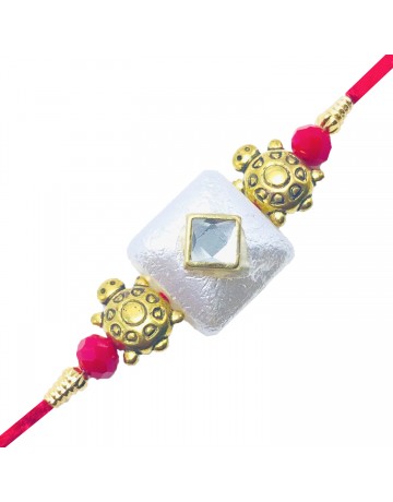 WHITE STONE WITH TORTOISE RAKHI